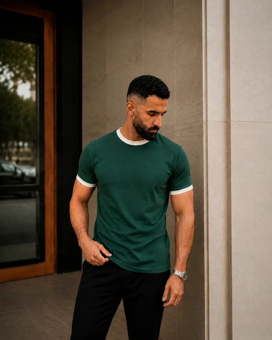 Model wearing RIVV Dark Green Ringer T-Shirt